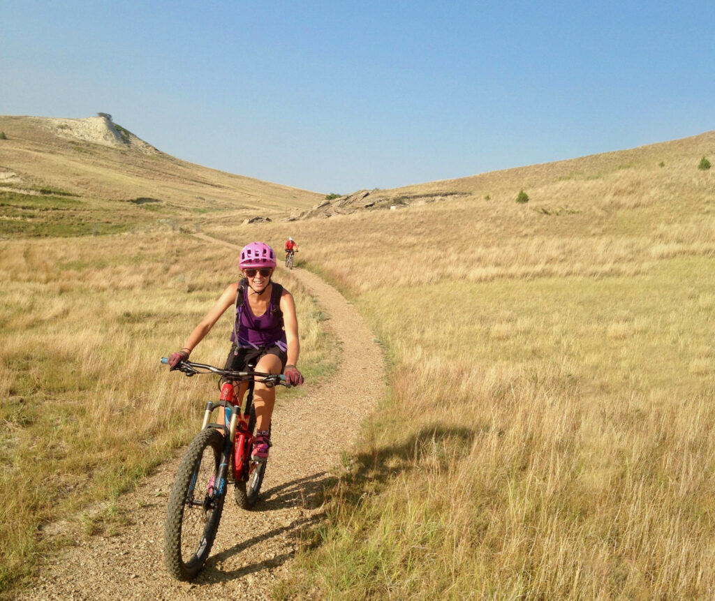 Cyclist enjoying the Maah Daah Hey Trail in North Dakota’s scenic Badlands