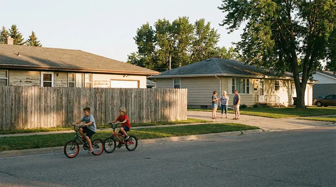 Best-State-to-Live-In-kids-driving-bicycle-on-the-street
